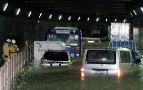 Typhoon strands vehicles in Haneda airport tunnel